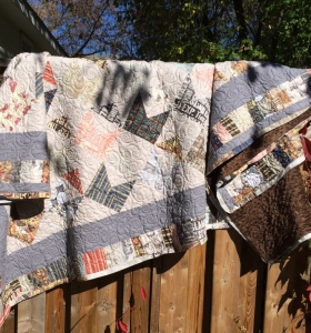 quilt on fence